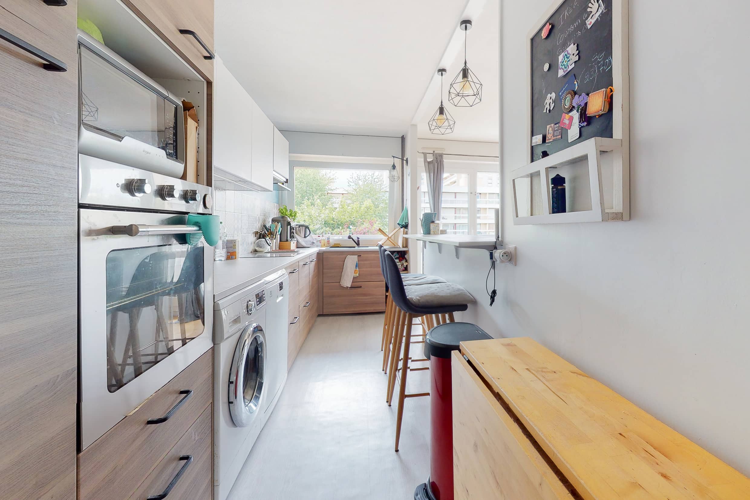 Photo de la cuisine d'un appartement tout équipée en bon état d'un appartement vendu par Pascal NICOLE